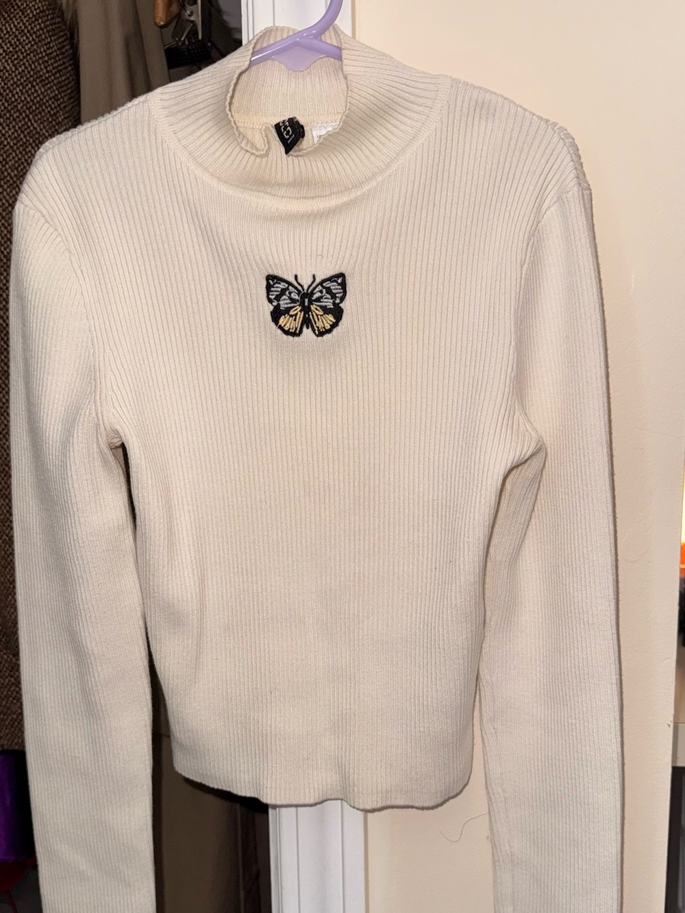H&M Cream Ribbed Turtleneck Sweater with Butterfly Patch